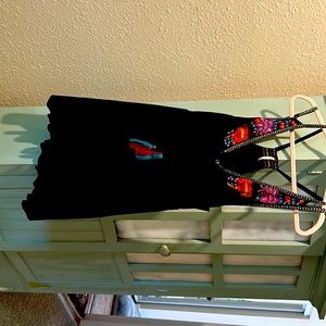Unique black boho Free People top w/ plunging Vneck and embroidery